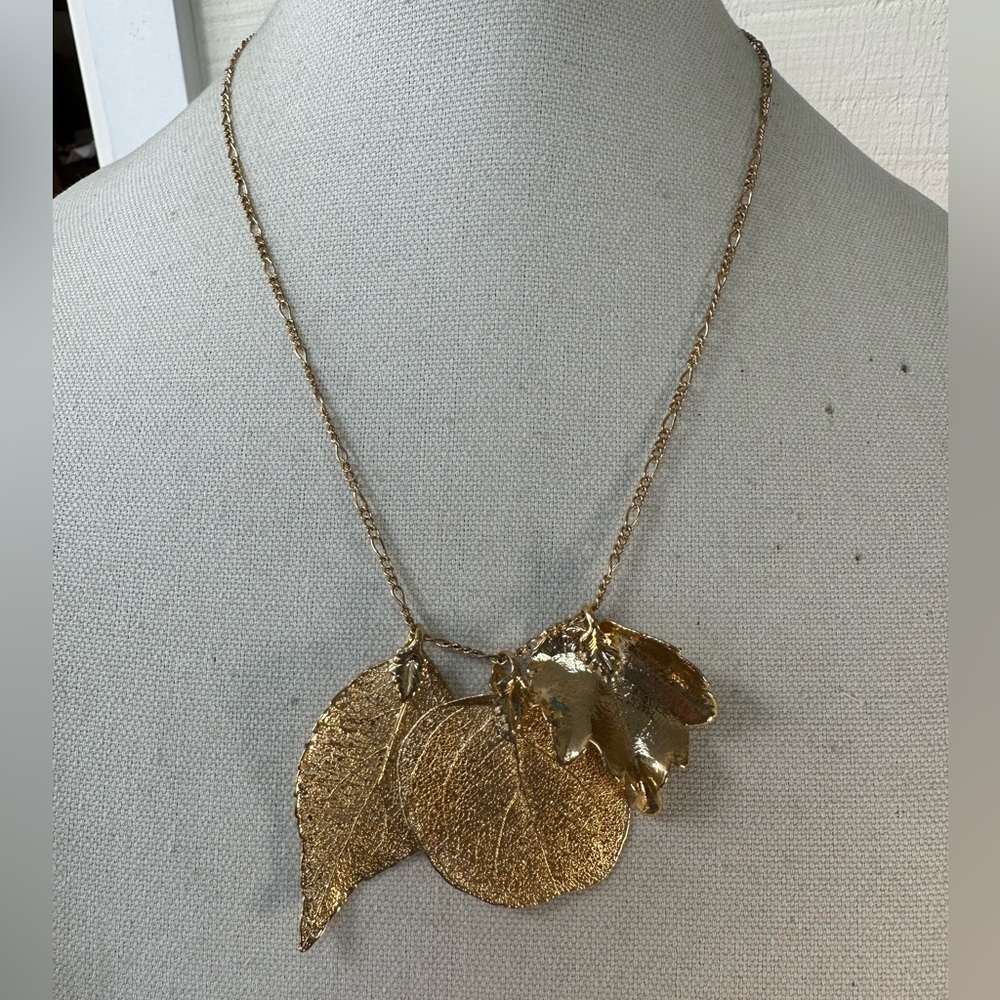Three dipped gold leaf pendants with chain necklace